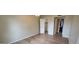 Spacious bedroom with a closet, a ceiling fan and wood-look flooring at 5435 W Christy Dr, Glendale, AZ 85304