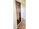 Bedroom closet with sliding mirror doors, shelving, and carpeted floor at 5435 W Christy Dr, Glendale, AZ 85304