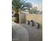 Inviting front entrance with decorative potted plants and a paved walkway at 5435 W Christy Dr, Glendale, AZ 85304