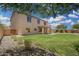 Expansive backyard featuring a green lawn and landscaping, perfect for outdoor activities and relaxation in a peaceful setting at 5440 W Apollo Rd, Laveen, AZ 85339