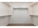Spacious walk-in closet with multiple rods and shelves for optimal organization and storage at 5440 W Apollo Rd, Laveen, AZ 85339