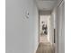 Hallway offers a view of the bedroom with an accent tree at 5702 S Beck Ave, Tempe, AZ 85283