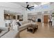 Inviting living room with modern decor, wood floors, and an open floor plan at 5711 E Corrine Dr, Scottsdale, AZ 85254