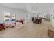 Bright, airy living room with expansive space, featuring neutral tones and large windows for abundant natural light at 5711 E Corrine Dr, Scottsdale, AZ 85254