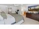 Bright and airy main bedroom features a comfortable layout and en-suite bathroom for added convenience at 5711 E Corrine Dr, Scottsdale, AZ 85254