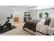 Relaxing main bedroom boasts pool access and a sleek ceiling fan, creating a private retreat at 5711 E Corrine Dr, Scottsdale, AZ 85254