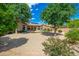 Backyard view of the pool, gravel and landscaping of this home at 6135 E Campo Bello Dr, Scottsdale, AZ 85254