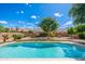 Relaxing pool surrounded by mature landscaping creates a private backyard oasis at 6135 E Campo Bello Dr, Scottsdale, AZ 85254