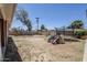This backyard features a play set and trampoline at 618 N Stapley Dr, Mesa, AZ 85203