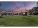 Spacious grassy backyard perfect for outdoor activities and relaxation at 618 N Stapley Dr, Mesa, AZ 85203