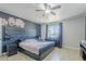 Nicely sized bedroom featuring a ceiling fan at 618 N Stapley Dr, Mesa, AZ 85203
