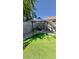 Backyard area featuring a gazebo and decorative fountain surrounded by gravel and artificial turf at 630 E Racine Pl, Casa Grande, AZ 85122
