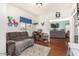 Comfortable bedroom with cozy seating, natural light, and a calming atmosphere at 630 E Racine Pl, Casa Grande, AZ 85122