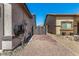 View of a side yard with gravel, connecting the front and back of the property at 630 E Racine Pl, Casa Grande, AZ 85122