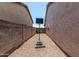 A gravel-covered side yard features a basketball hoop at 630 E Racine Pl, Casa Grande, AZ 85122
