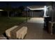 Expansive backyard featuring a covered patio, stone pavers, and ample space for outdoor enjoyment at 6725 W Cypress St, Phoenix, AZ 85035