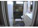 Well-lit bathroom showcasing tiled walls, a shower, and white vanity, providing a functional and updated feel at 6725 W Cypress St, Phoenix, AZ 85035