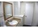 Bright bathroom features a framed mirror and updated vanity at 6725 W Cypress St, Phoenix, AZ 85035