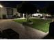 Beautiful front yard featuring pavers, manicured landscaping, and decorative trees for curb appeal at 6725 W Cypress St, Phoenix, AZ 85035