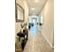 Inviting hallway showcases modern decor and tiled floors leading to living areas at 8024 W State Ave, Glendale, AZ 85303