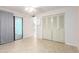 Bright bedroom with sliding glass door to pool area and large closet at 9227 N 36Th Dr, Phoenix, AZ 85051