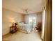 Comfortable carpeted bedroom offering a ceiling fan and a tranquil atmosphere at 9406 S 47Th Pl, Phoenix, AZ 85044