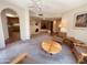Cozy living room with a unique fireplace and comfortable seating area at 9406 S 47Th Pl, Phoenix, AZ 85044