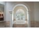 Bathroom featuring a soaking tub with natural light at 10800 E Cactus Rd # 34, Scottsdale, AZ 85259