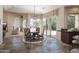 Casual dining area with views of the back yard, opening onto the patio for entertaining at 10800 E Cactus Rd # 34, Scottsdale, AZ 85259