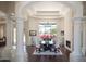 Elegant dining room with large windows, fireplace, and sophisticated decor is perfect for entertaining guests at 10800 E Cactus Rd # 34, Scottsdale, AZ 85259