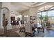 Bright dining area featuring a bar and view of the backyard creates an inviting space at 10800 E Cactus Rd # 34, Scottsdale, AZ 85259