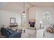 Spacious living room featuring a fireplace, vaulted ceilings, and neutral tones offers comfortable living at 10800 E Cactus Rd # 34, Scottsdale, AZ 85259