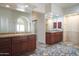 Spacious bathroom with dual sinks, ample counter space, and tile flooring at 10800 E Cactus Rd # 34, Scottsdale, AZ 85259