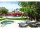 Resort-style backyard featuring pool, spa, and stylish chaise lounges for relaxing at 10800 E Cactus Rd # 34, Scottsdale, AZ 85259