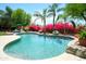 Inviting pool area with colorful bougainvillea and plenty of lounge space at 10800 E Cactus Rd # 34, Scottsdale, AZ 85259