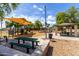Park featuring playground, shaded picnic spots, and barbecue grills for community enjoyment at 12428 W Vermont Ct, Litchfield Park, AZ 85340