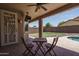 Covered patio with a ceiling fan and a view of the backyard at 12503 W Vista Paseo Dr, Litchfield Park, AZ 85340