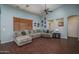 Bright and airy living room with a comfortable sofa and stylish decor at 12503 W Vista Paseo Dr, Litchfield Park, AZ 85340