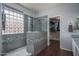 Tiled walk-in shower adjacent to the walk-in closet at 12503 W Vista Paseo Dr, Litchfield Park, AZ 85340