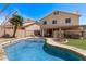 This private backyard features a refreshing pool, covered patio, and ample space for outdoor enjoyment at 13270 N 93Rd Way, Scottsdale, AZ 85260