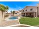 This private backyard features a refreshing pool, covered patio, and ample space for outdoor enjoyment at 13270 N 93Rd Way, Scottsdale, AZ 85260
