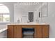 Bathroom with tub, double sink vanity, and large mirror at 13270 N 93Rd Way, Scottsdale, AZ 85260