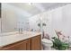 Bathroom with shower featuring a floral curtain and a vanity at 13270 N 93Rd Way, Scottsdale, AZ 85260