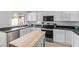 Bright eat-in kitchen features modern appliances, granite countertops, and lots of cabinet space at 13270 N 93Rd Way, Scottsdale, AZ 85260