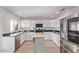 Bright kitchen features modern appliances, granite countertops, and a kitchen island at 13270 N 93Rd Way, Scottsdale, AZ 85260