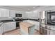 Bright kitchen features modern appliances, granite countertops, and a kitchen island at 13270 N 93Rd Way, Scottsdale, AZ 85260