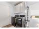 Bright laundry room features new washer and dryer at 13270 N 93Rd Way, Scottsdale, AZ 85260