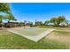 Neighborhood park featuring a basketball court, open green space, and mature trees at 13270 N 93Rd Way, Scottsdale, AZ 85260
