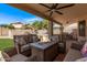 Inviting outdoor patio featuring comfortable seating and a cozy fire pit for relaxing evenings at 13270 N 93Rd Way, Scottsdale, AZ 85260