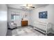 Cozy Bedroom/bedroom with neutral colors, ceiling fan and ample natural light at 13416 W Ventura St, Surprise, AZ 85379